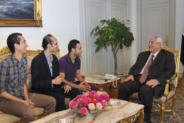 Egypt's interim President Adli Mansour (R) meets members of the Tamarud "rebel" protest movement at El-Thadiya presidential palace in Cairo in this handout picture dated July 6, 2013. REUTERS/Egyptian Presidency/Handout (EGYPT - Tags: POLITICS) ATTENTION EDITORS - NO SALES. NO ARCHIVES. THIS IMAGE WAS PROVIDED BY A THIRD PARTY. FOR EDITORIAL USE ONLY. NOT FOR SALE FOR MARKETING OR ADVERTISING CAMPAIGNS. THIS PICTURE IS DISTRIBUTED EXACTLY AS RECEIVED BY REUTERS, AS A SERVICE TO CLIENTS