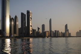 ABU DHABI, UNITED ARAB EMIRATES - FEBRUARY 05: A general view of the city skyline at sunset from Dhow Harbour on February 5, 2015 in Abu Dhabi, United Arab Emirates. Abu Dhabi is the capital of the United Arab Emirates and the second most populous city after Dubai with a population of around two million people.