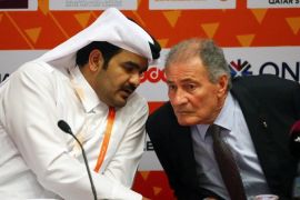 Sheikh Joaan bin Hamad al-Thani (L), president of the Qatar 2015 Organising Committee of the Handball World Cup talks with Hassan Moustafa, President of the International Handball Federation during a press conference on February 1, 2015 in Doha before the handball World Cup final match Qatar against France. If France win, they will be the first team to have won the World title five times; If Qatar take the gold trophy, they will be the first non-European side to do so. AFP PHOTO / MARWAN NAAMANI