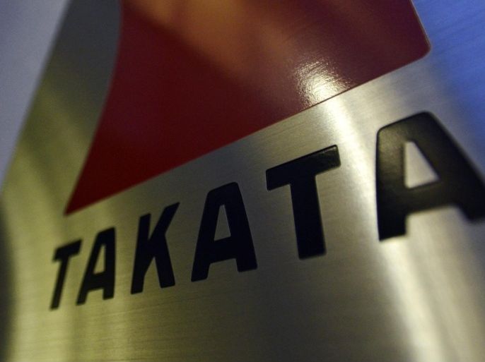 (FILE) A file picture dated 11 April 2013 of the logo of Japanese auto-parts supplier Takata Corp. at the company's Tokyo headquarters in Tokyo, Japan. Takata Corp announced 05 February 2015 that it expanded its net loss outlook for the current financial year amid growing costs to deal with the global recall of its defective airbags. Takata now estimates a group net loss of 264.5 million USD for the year to March.
