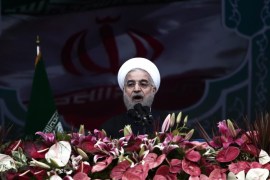 Iranian President Hassan Rouhani delivers a speech in Tehran's Azadi Square (Freedom Square) to mark the 36th anniversary of the Islamic revolution on February 11, 2015. Rouhani said the world needs Iran to help stabilise the troubled Middle East, in remarks pointing to wider ramifications of a deal over its disputed nuclear programme. AFP PHOTO / BEHROUZ MEHRI