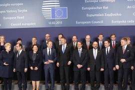 Heads of State and government pose for a group photo at an EU summit in Brussels on Thursday, Feb. 12, 2015. EU leaders meet for a one-day summit on Thursday to discuss, among other issues, European banks and the situation in Ukraine. (AP Photo/Michel Euler)