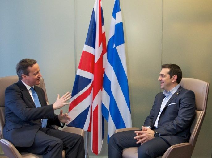 BRUSSELS, BELGIUM - FEBRUARY 12: British Prime Minister David Cameron (L) and Greece's Prime Minister Alexis Tsipras (R) meet prior to the EU leaders summit in Brussels, Belgium on February 12, 2015.