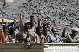 Houthi rebels ride a truck in Sanaa February 15, 2015. Tens of thousands of Yemenis demonstrated in several cities on Saturday against the rule of the Shi'ite Muslim Houthi movement as clashes between Houthis and Sunnis in a southern mountainous region left 26 dead. REUTERS/Khaled Abdullah (YEMEN - Tags: POLITICS CIVIL UNREST)