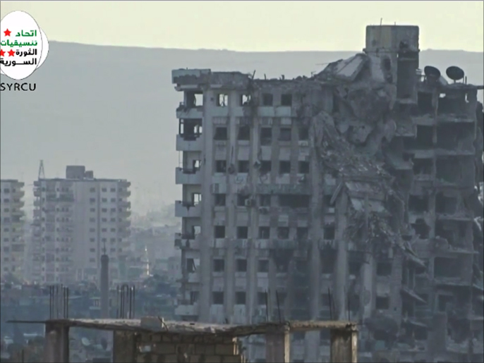 ‪مبنى دار المعلمين في حي جوبر بدمشق تعرض لتدمير جزئي‬ (ناشطون)