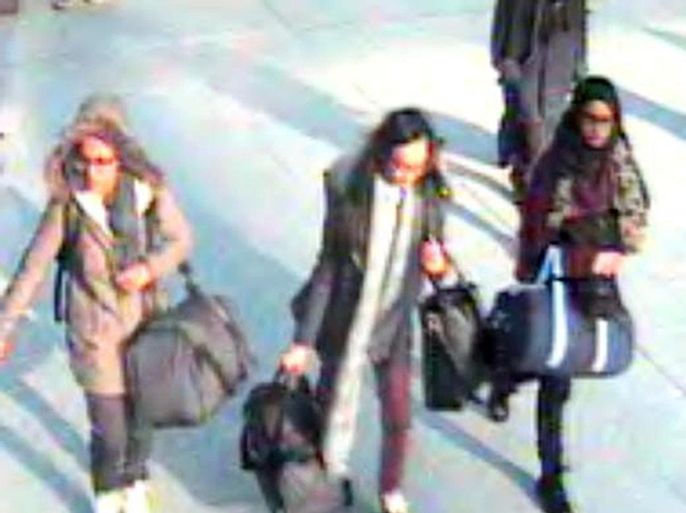 CORRECTING DATE TO MONDAY FEB. 23 - This is a still taken from CCTV issued by the Metropolitan Police in London on Monday Feb. 23, 2015, of 15-year-old Amira Abase, left, Kadiza Sultana,16, centre, and Shamima Begum, 15, going through Gatwick airport, south of London, before they caught their flight to Turkey on Tuesday Feb 17, 2015. The three teenage girls left the country in a suspected bid to travel to Syria to join the Islamic State extremist group. (AP Photo/Metropolitan Police) NO ARCHIVE