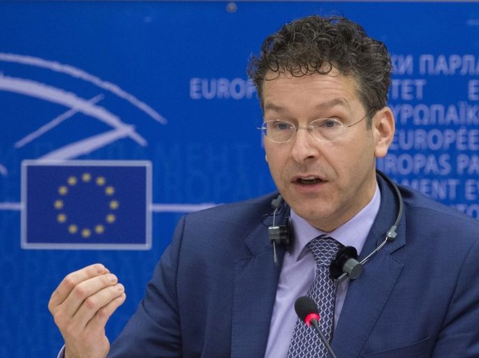 Eurogroup President and Dutch Finance Minister Jeroen Dijsselbloem gestures as he speaks in front of Committee on Economic and Monetary Affairs members at the EU Parliament in Brussels on February 24, 2015. Greece's new government is committed to reforms but a list of steps sent to Brussels on February 24 in return for a bailout extension is only the first stage in negotiations, Eurogroup chief Jeroen Dijsselbloem said. AFP PHOTO / JOHN THYS