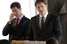 Britain's Chief Secretary to the Treasury, Danny Alexander (R), speaks as deputy Prime Minister, Nick Clegg, listens during a news conference in London February 5, 2015. Britain's Liberal Democrats on Thursday set out plans to use an equal mix of spending cuts and tax changes to wipe out the budget deficit if they are included as junior partners in a possible coalition after a May national election. REUTERS/Peter Nicholls (BRITAIN - Tags: POLITICS BUSINESS)