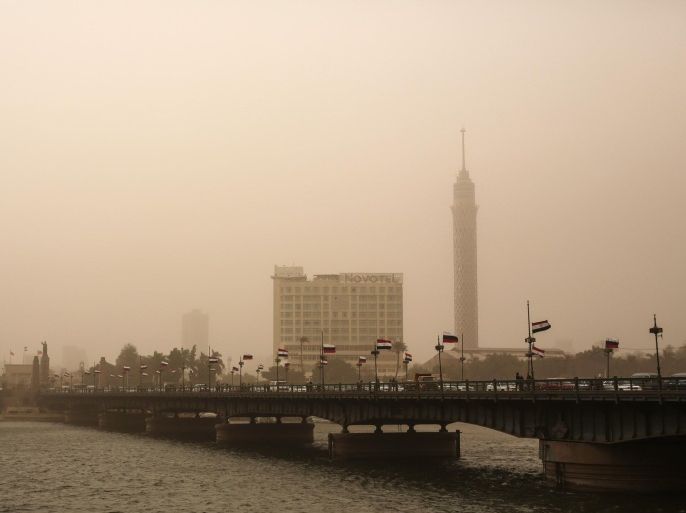 A general view of the Cairo Tower during a sandstorm in Egypt, Tuesday, Feb. 10, 2015. Egyptian officials say Cairo International Airport has been closed to arrivals amid a developing sandstorm. The sandstorm hit Egypt Tuesday after unusually warm and sunny weather for February. The sky over downtown Cairo turned yellow and blotted out the sun, limiting visibility. (AP Photo/Mosa'ab Elshamy)
