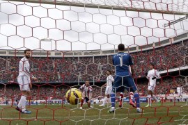 Real Madrid's goakeeper Iker Casillas (2R) couldn't stop the goal scored by Portuguese midfielder Tiago Mendes (not at the image) of Atletico Madrid during their Spanish Primera Division league soccer match played between Atletico Madrid and Real Madrid played at the Vicente Calderon stadium in Madrid, Spain, 07 February 2015.