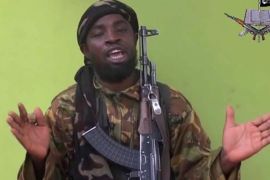 FILE -This is a Monday May 12, 2014 file photo taken from video by Nigeria's Boko Haram terrorist network, showing their leader Abubakar Shekau speaking to the camera. Suspected Boko Haram Islamic extremists attacked a Cameroonian military base near the border with Nigeria, killing at least five soldiers, an army colonel said Tuesday, Feb. 17, 2015. (AP Photo, File)