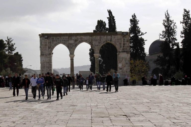 JERUSALEM - JANUARY 02: Palestinians perform Friday Prayer at Al Aqsa Mosque in Jerusalem on January 02, 2015. There is no incident reported after Israeli government cancels age restriction for Palestinians, on entrance of the Al Aqsa Mosque.