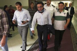 Egyptian steel tycoon Ahmed Ezz is seen at a prosecution office after he left jail, in Cairo, August 7, 2014. Ezz, arrested after the 2011 uprising that ousted Hosni Mubarak, left jail after paying bail and fines in three corruption cases against him, security and judicial sources said. Ezz paid 11 million Egyptian pounds ($1.54 million) in fines on Thursday, having already covered a total of 152 million in bail charges. The former owner of Ezz Steel - the country's largest steel maker- was jailed six days after Mubarak stepped down. .REUTERS/Al Youm Al Saabi Newspaper (EGYPT - Tags: POLITICS CRIME LAW) EGYPT OUT. NO COMMERCIAL OR EDITORIAL SALES IN EGYPT