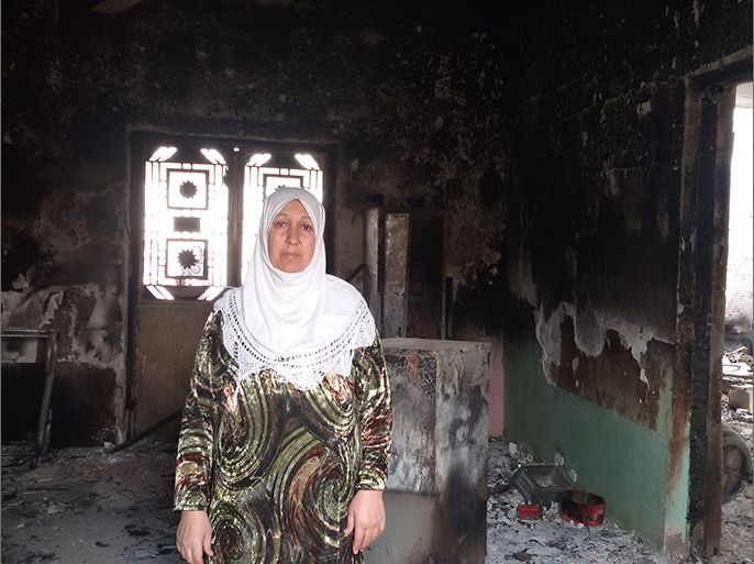 ام احمد داخل بيت محترق