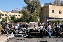 A photo released by the official Syrian Arab News Agency (SANA) shows damages at the site that was hit by a car bomb explosion, in Damascus, Syria, 13 May 2014. According to SANA, four people were killed in the car bomb attack that occurred near the schools compound in al-Arin neighborhood in Damascus countryside. EPA/SANA HANDOUT