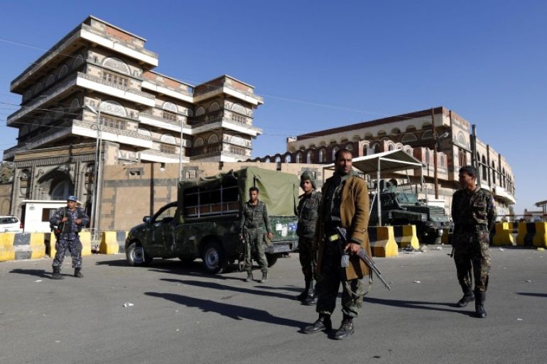 Yemeni soldiers stand guard outside the US Embassy in Sana'a, Yemen, 11 February 2015. The United States shut its embassy in Yemen 'due to the uncertain security situation,' the State Department said late 10 February 2015, as the country goes through a crisis following a takeover by Houthi rebels.