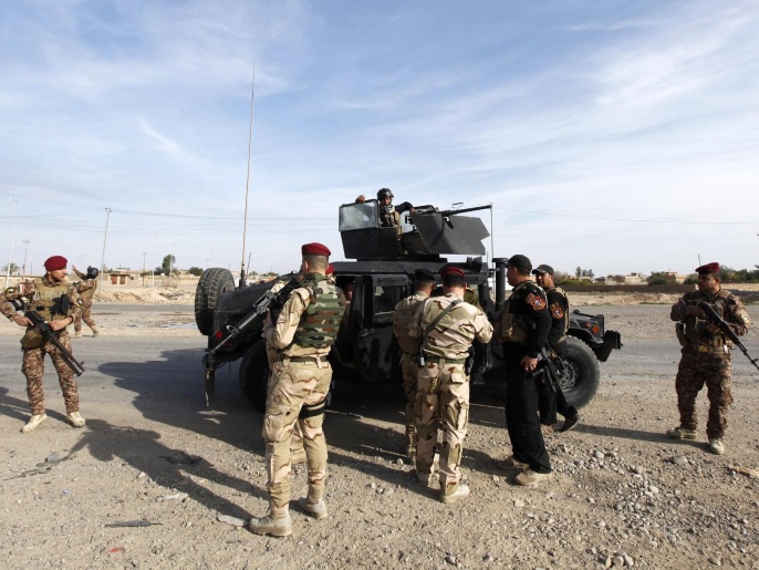 قوات عراقية خلال عملية سابقة قرب بيجي(رويترز/أرشيف)