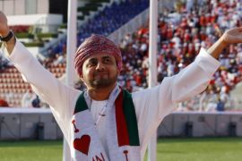 Khaled bin Hamad al-Busaidi, president of Oman's football federation, waves before the start of the final soccer match between their team and Saudi Arabia during the 19th Gulf Cup soccer tournament in Muscat January 17, 2009.