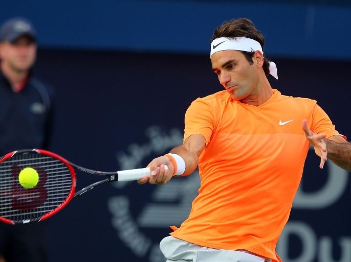 DUBAI, UNITED ARAB EMIRATES - FEBRUARY 27: Roger Federer of Switzerland in action against Borna Coric of Croatia during day five of the ATP Dubai Duty Free Tennis Championships at the Dubai Duty Free Stadium onon February 27, 2015 in Dubai, United Arab Emirates.