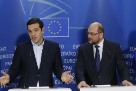 Greek Prime Minister Alexis Tsipras (L) gives a press briefing at the end of the meeting with President of the European Parliament Martin Schulz (R) at the European Parliament in Brussels, Belgium, 04 February 2015. Greek Prime Minister Alexis Tsipras met with European Union officials in Brussels during a week of intense diplomatic efforts by Athens' new government to renegotiate the terms of its international bailout.