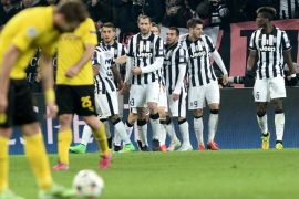 Juventus' players celebrates after Alvaro Morata scored during the Champions League round of 16 first leg soccer match between Juventus and Borussia Dortmund at the Juventus Stadium, in Turin, Italy, Tuesday, Feb. 24, 2015. (AP Photo/ Massimo Pinca)