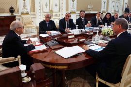 Tunisian President Beji Caid Essebsi (L) addresses the High Council of Ministers at the Carthage Palace, in Tunis, Tunisia, 18 February 2015. According to reports four members of the Tunisian police forces were killed late 17 February when 20 gunmen from the al-Qaeda affiliated Phalange Okba Ibn Nafaa group attacked a checkpoint near the Algerian border, stealing their weapons in the fray.