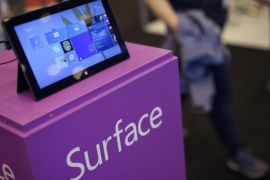A Windows Surface RT tablet sits on display on the Windows stand during the Apps World Multi-Platform Developer Show in London, U.K., on Wednesday, Oct. 23, 2013. Retail sales of Internet-connected wearable devices, including watches and eyeglasses, will reach $19 billion by 2018, compared with $1.4 billion this year, Juniper Research said in an Oct. 15 report.