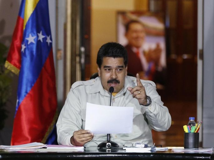 Venezuela's President Nicolas Maduro speaks during a meeting with supporters at Miraflores Palace in Caracas, February 19, 2015. REUTERS/Carlos Garcia Rawlins (VENEZUELA - Tags: POLITICS)