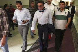 Egyptian steel tycoon Ahmed Ezz is seen at a prosecution office after he left jail, in Cairo, August 7, 2014. Ezz, arrested after the 2011 uprising that ousted Hosni Mubarak, left jail after paying bail and fines in three corruption cases against him, security and judicial sources said. Ezz paid 11 million Egyptian pounds ($1.54 million) in fines on Thursday, having already covered a total of 152 million in bail charges. The former owner of Ezz Steel - the country's largest steel maker- was jailed six days after Mubarak stepped down. .REUTERS/Al Youm Al Saabi Newspaper (EGYPT - Tags: POLITICS CRIME LAW) EGYPT OUT. NO COMMERCIAL OR EDITORIAL SALES IN EGYPT