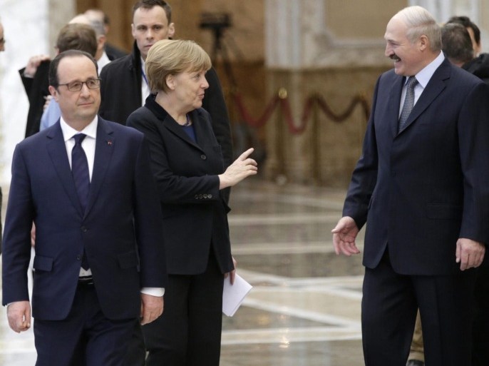 German Chancellor Angela Merkel (C) and French President Francois Hollande (L) say goodbye to Belarusian President Alexander Lukashenko (R) as they leave the Ukrainian peace negotiations in Minsk, Belarus, 12 February 2015. A ceasefire agreement for Ukraine has been reached at peace talks in Belarus and will take effect at midnight on 15 February, Russian President Vladimir Putin said after talks with German Chancellor Angela Merkel.