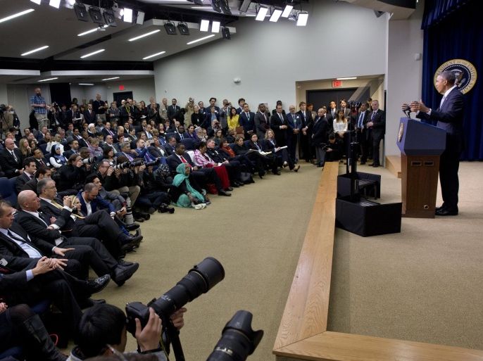 Attendees of the White House Summit on Countering Violent Extremism listen as President Barack Obama speaks, Wednesday, Feb. 18, 2015, in the South Court Auditorium of the Eisenhower Executive Office Building on the White House Complex in Washington. (AP Photo/Jacquelyn Martin)