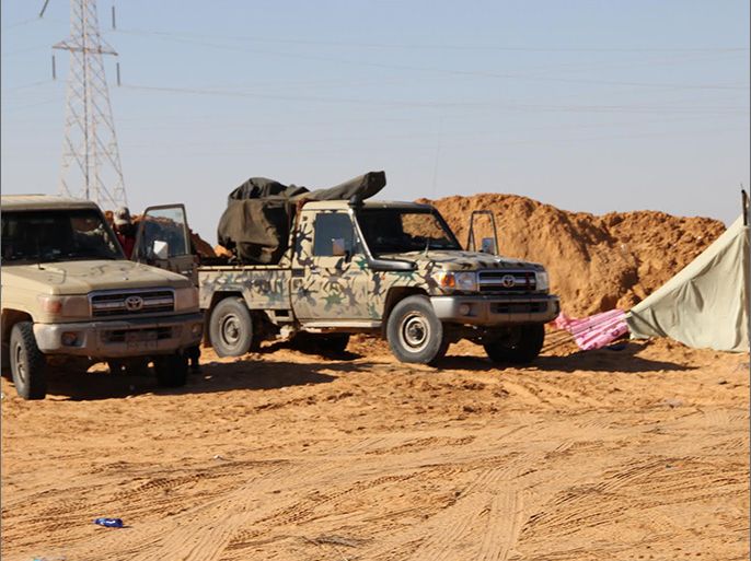 صورة فجر ليبيا: ليبيا/ عربات تابعة لقوات فجر ليبيا التي تقاتل ضد قوات خليفة حفتر (الجزيرة نت)