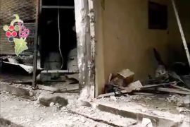 آثار القصف الصاروخي على مدينة دوما