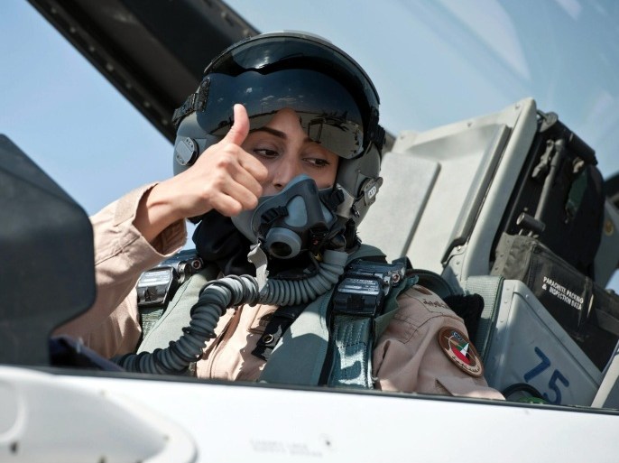 A handout photograph made available by the United Arab Emirates Official News Agency (WAM) 26 September 2014, shows the United Arab Emirates' first female pilot, Major Mariam al-Mansouri, giving the thumbs up from the cockpit of her F-16 fighter jet, United Arab Emirates, 18 June 2013. According to media reports the major took part in the air strikes on Islamic State (IS) targets in Syria which form part of the US led international anti-IS coalition's strategy to reduce the capacities of the radical groups who have made major gains across Syria and Iraq in recent months. EPA/ALI ALJENIBI /EMIRATES OFFICIAL NEWS AGENCY / HANDOUT