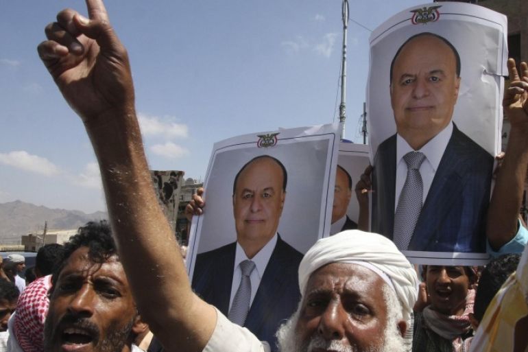 Protesters shout slogans during a demonstration to show support to Yemen's ousted president Abd-Rabbu Mansour Hadi in the southwestern city of Taiz February 22, 2015. Hadi appeared to rescind his resignation and attempt to reclaim his position in a statement on Saturday after escaping house arrest by the Houthi militia in the capital Sanaa and fleeing to Aden. REUTERS/Anees Mahyoub (YEMEN - Tags: CIVIL UNREST POLITICS)