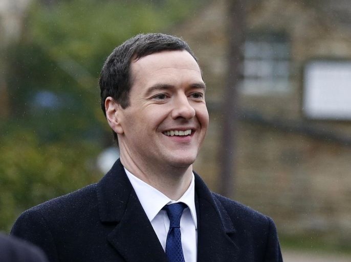 LEEDS, UNITED KINGDOM - FEBRUARY 05: Kelvin Fletcher (R) and the Chancellor Of The Exchequer George Osborne during a visit to the set of television series Emmerdale on the Harewood Estate on February 5, 2015 in Leeds, England.