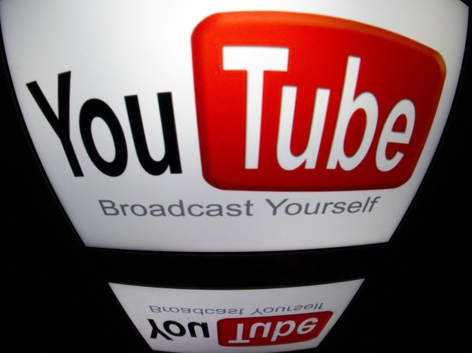 The 'YouTube' logo is seen on a tablet screen on December 4, 2012 in Paris.