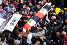 People carry the coffin of Shaimaa al-Sabbagh during her funeral, Alexandria, Egypt, 25 January 2015. Al-Sabbagh a leftist activist was killed when police broke up a rally near Tahrir Square 24 January commemorating the 2011 protests which led to the fall of the Mubarak regime, and according to media reports 11 people have died in different parts of Egypt amid violence related to the commemoration of that anniversary 25 January.