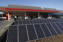 Solar panels are seen at PetroChina's solar-powered Yizhuang gas station in Beijing, January 9, 2015. Reuters photographers from Mali to Mexico have shot a series of pictures of fuel stations. Whether it is plastic bottles by the roadside in Malaysia or a futuristic forecourt in Los Angeles, fuel stations help define our world. Oil prices steadied above $48 a barrel on Tuesday, recovering from earlier losses as the dollar weakened against the euro. Oil prices have dropped nearly 60 percent since peaking in June 2014 on ample global supplies from the U.S. shale oil boom and a decision by OPEC to keep its production quotas unchanged. REUTERS/Kim Kyung-Hoon (CHINA - Tags: BUSINESS COMMODITIES ENERGY SCIENCE TECHNOLOGY)ATTENTION EDITORS: PICTURE 12 OF 26 FOR WIDER IMAGE PACKAGE 'AT THE PUMP - THE WORLD FILLS UP' SEARCH 'WORLD FILLS UP' FOR ALL IMAGES