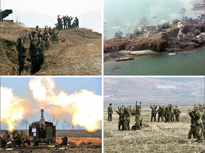 epa04630033 An undated file combo picture made available on 21 February 2015 shows North Korean soldiers conducting a live-fire artillery and landing exercise at an undisclosed location near the western border with South Korea, North Korea. On 21 February 2015, according to media reports citing Pyongyang's media, North Korean leader Kim Jong-un inspected an army drill for 'striking and seizing' an island. EPA/YONHAP SOUTH KOREA OUT -- BEST QUALITY AVAILABLE