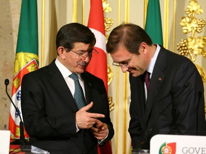 LISBON, PORTUGAL - MARCH 03: Turkish Prime Minister Ahmet Davutoglu (L) and his Portuguese counterpart Pedro Passos Coelho (R) attend a press conference after a meeting at the Portuguese foreign ministry building in Lisbon, Portugal on March 03, 2015.