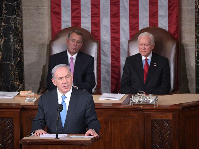 Israel's Prime Minister Benjamin Netanyahu addresses a joint session of the US Congress on March 3, 2015 at the US Capitol in Washington, DC. Netanyahu was invited by House Speaker John Boehner to address Congress without informing the White House. Looking on are House Speaker John Boehner(L) and President pro tempore of the Senate Sen. Orrin Hatch.AFP