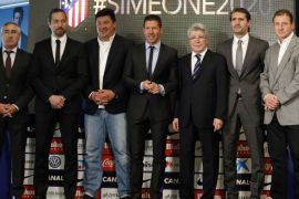 MADRID, SPAIN - MARCH 24: Atletico Madrid head coach Diego Simeone (C), Atletico Madrid President Enrique Cerezo (3rd R) and Jose Luis Perez Caminero (2nd R), Atletico's Sporting Director, pose during a press conference at the Vicente Calderon Stadium in Madrid, Spain on March 24, 2015. The club have announced that Atletico Madrid head coach Diego Simeone has signed contract extension with Atletico Madrid until 2020.
