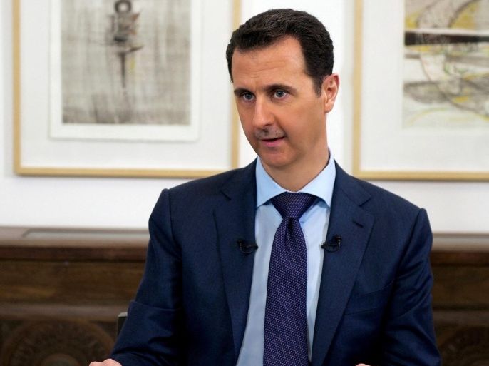 A handout picture made available 27 March 2015 by the Syrian Arab News Agency (SANA) shows Syrian President, Bashar al-Assad, during an interview with Russian media, Damascus, Syria, 25 March 2015. During the interview al-Assad claimed that he had so far had no talks with the US regarding a solution to the ongoing civil war in Syria but hailed talks in Russia scheduled for 06-09 April as a positive step, despite suggestions he would not be attending, further adding that the crisis affecting Syria, as in the Ukraine, was a political plot to weaken his long term supporter, Russia. EPA/SYRIAN ARAB NEWS AGENCY / HANDOUT