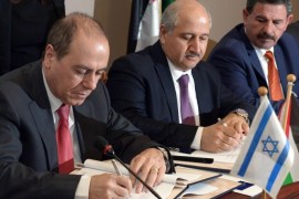 A handout photo provided by the Government Press Office (GPO) on 26 February 2015 of Silvan Shalom (L), Israel's Minister of Energy and Water, and Hazem Nasser (2-L), Jordan's Minister of Water and Irrigation and Minister of Agriculture signing a bilateral agreement on the Jordanian Dead Sea, 26 February 2015, to establish a sea canal that will link the Red Sea and the Dead Sea, in order to provide water to the world's lowest area and dob of water, and save the shrinking Dead Sea. Others are not identified. EPA/HAIM ZACK/HANDOUT