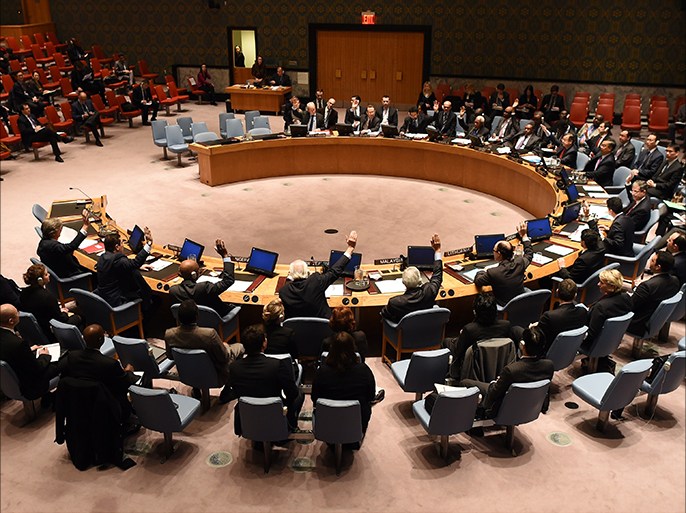 The United Nations Security Council votes during a meeting on non-proliferation in North Korea on March 4, 2015 at the United Nations in New York. AFP