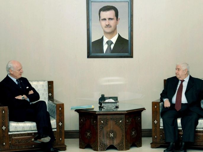 A handout picture made available by Syrian Arab News Agency (SANA) shows Syrian Foreign Minister Walid al-Moallem (R) meeting with The UN peace envoy to Syria Staffan de Mistura in Damascus, Syria, 28 February 2015. EPA/SANA / HANDOUT