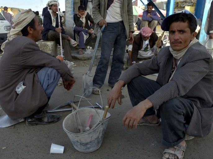 Unemployed Yemeni men wait to be hired at an outdoor labor market in Sana'a, Yemen, 08 April 2013. Reports state the World Bank has designed a 25 million US dollar-project to help create new work opportunities for unemployed Yemenis as unemployment rates among young people reach as high as 40 per cent.