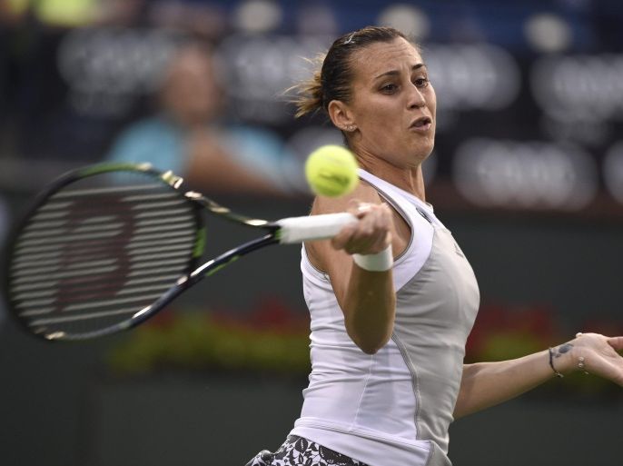 Flavia Pennetta of Italy in action during her fourth round match against Maria Sharapova of Russia at the BNP Paribas Open tennis tournament in Indian Wells, California, USA, 17 March 2015.