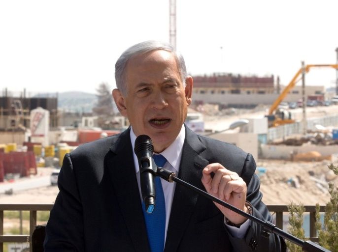 Israeli Prime Minister and Likud party's candidate running for general elections, Benjamin Netanyahu gives a statement to the press during his visit in Har Homa, an Israeli settlement neighbourhood of annexed east Jerusalem, on March 16, 2015 on the eve of Israels general elections. AFP PHOTO / MENAHEM KAHANA